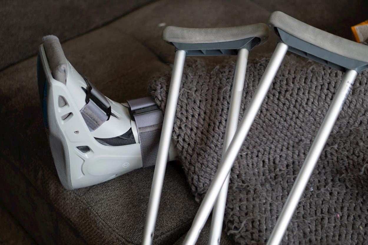 A person using crutches in the office of a personal injury attorney in Columbia, SC