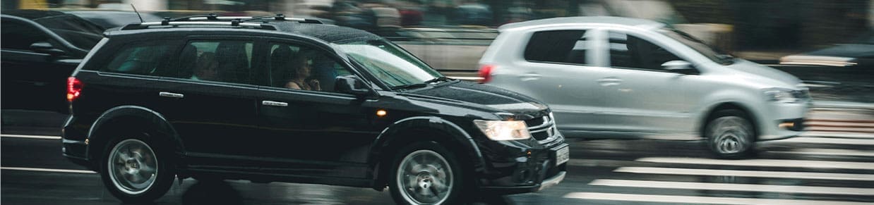 A black SUV being driving to the office of a South Carolina car accident lawyer