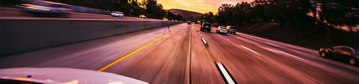 A vehicle driving down the highway