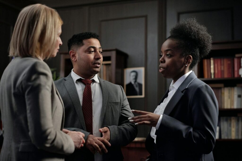 An experienced lawyer discussing a case with a client