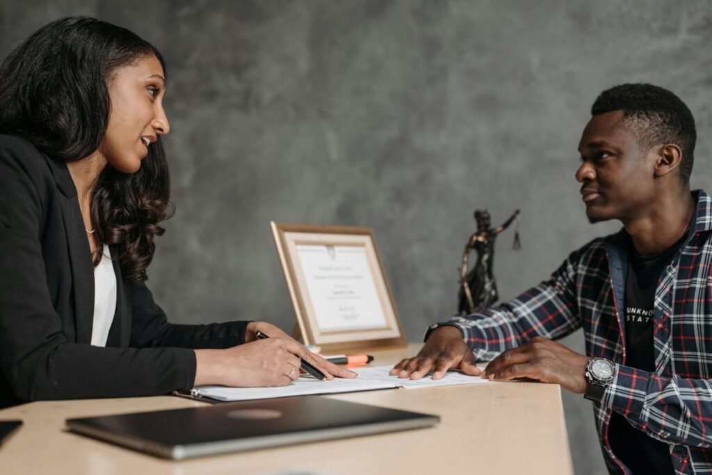 A person speaking with an attorney