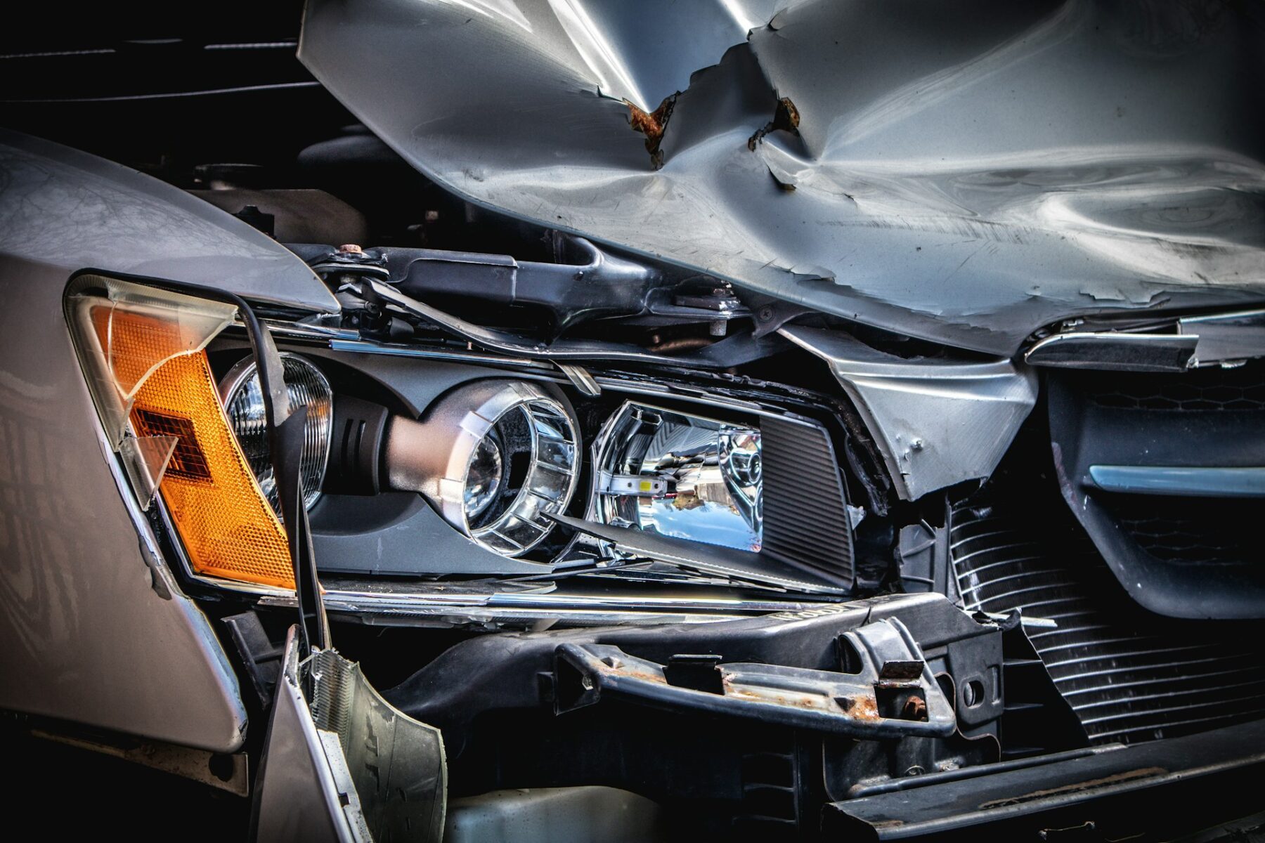 A silver car after a car accident