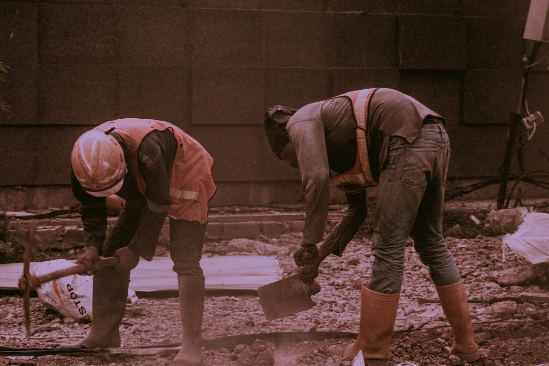 Two adults working alongside each other before they take part in a Newberry workers’ comp case