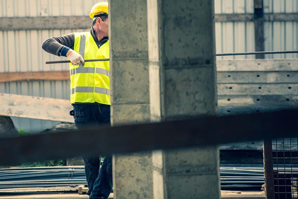 A construction worker before getting injured and forming a workers’ comp case in Hampton