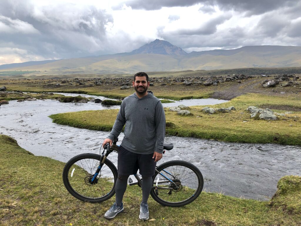 Ramie Shalabi biking in Ecuador